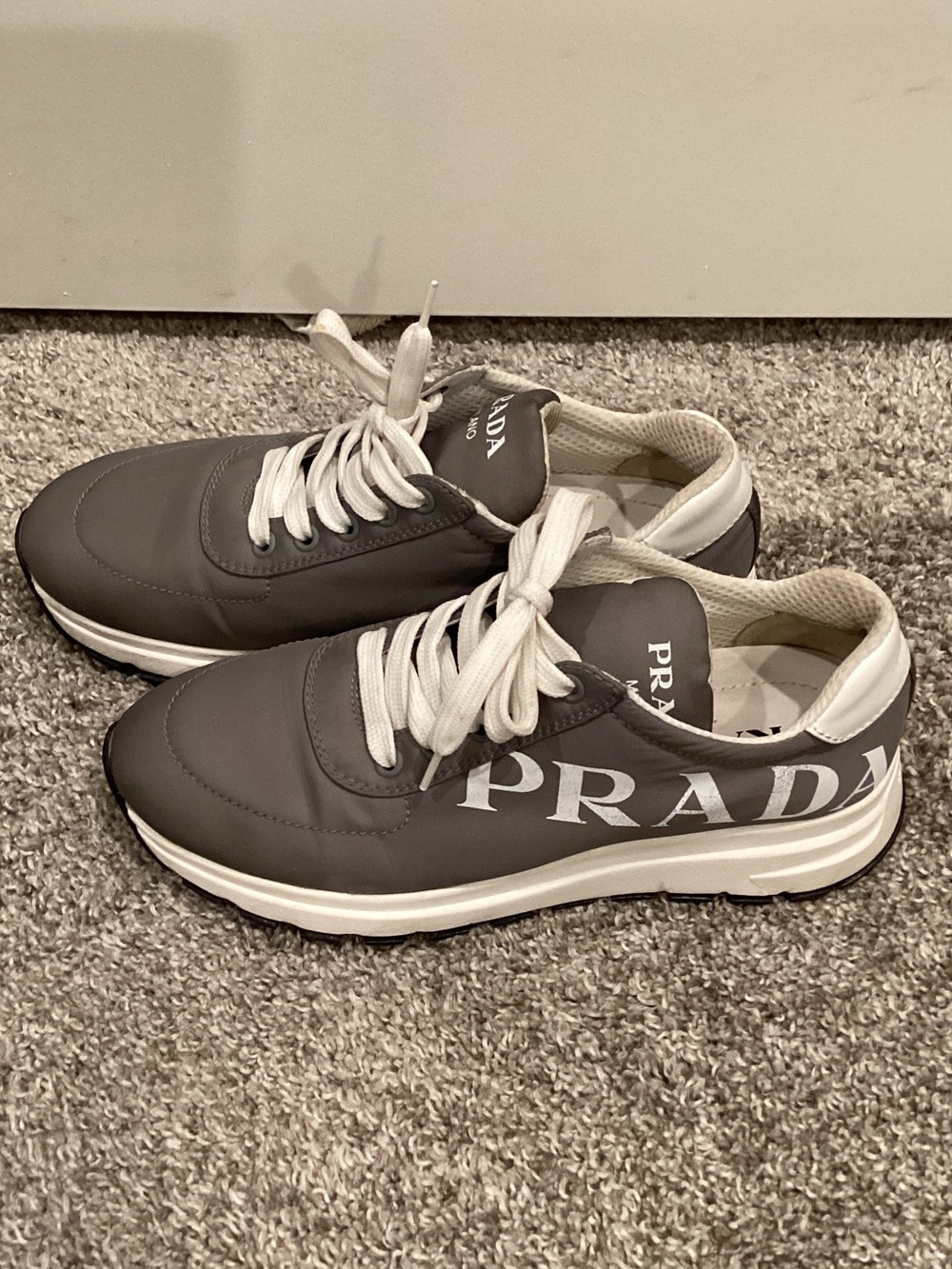 Prada Women’s Gray and White Logo Runner Sneakers